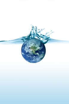 planet earth falling in some blue water