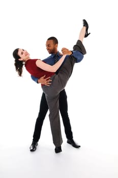 young multi ethnic couple beautiful dancing on white