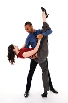 young multi ethnic couple beautiful dancing on white