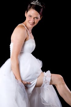 White Bride at her wedding posing with veil