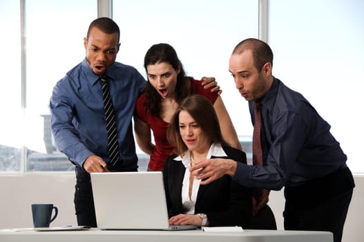group of business people at an office desk