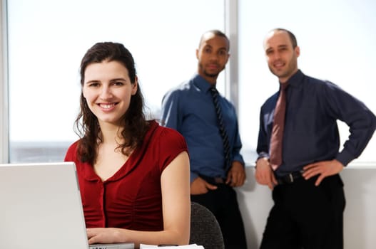 business team with a woman in the foreground