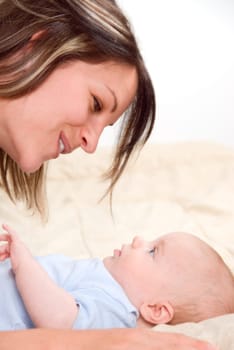 mom playing fun things with her baby boy
