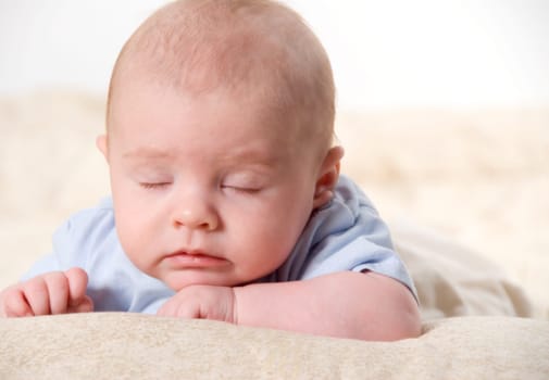 new born baby dosing off during a shoot