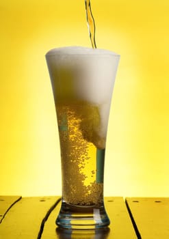 pouring beer in a glass