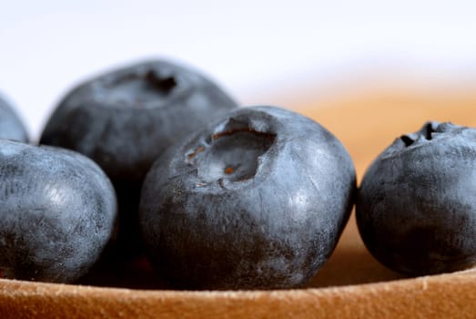 macro of blueberries on a spoon