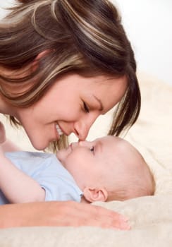 mom playing fun things with her baby boy
