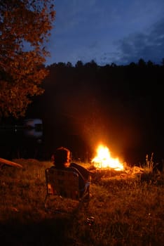 woman looking at fire