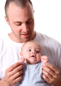 dad playing with his cute son in blue