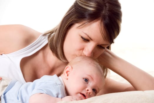 mom playing fun things with her baby boy