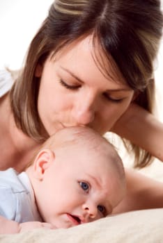 mom playing fun things with her baby boy