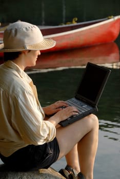 woman relaxing with laptop