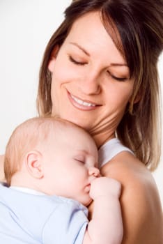 new mom holding her newborn baby boy