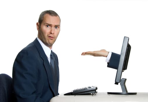 hand coming out of lcd screen with baffled man