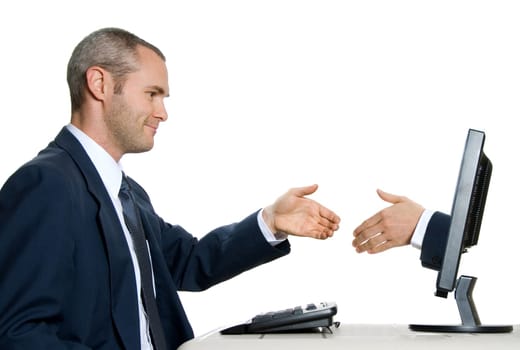 man in blue suit shaking hands with virtual hand