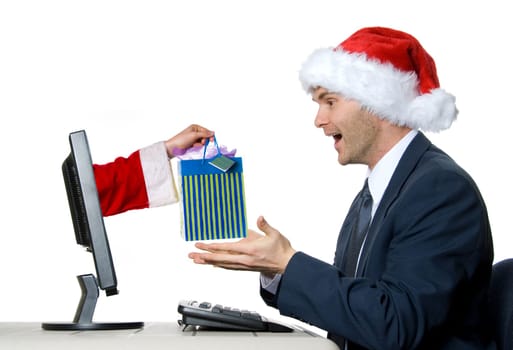 man receiving a x-mas gift by internet via santa