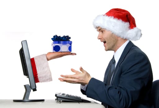 man receiving a x-mas gift by internet via santa