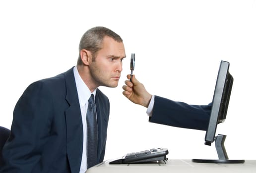man in blue suit doing some research on the internet