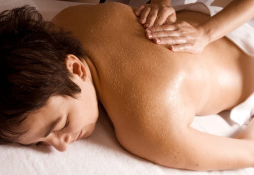 nice woman relaxing with a massage therapy