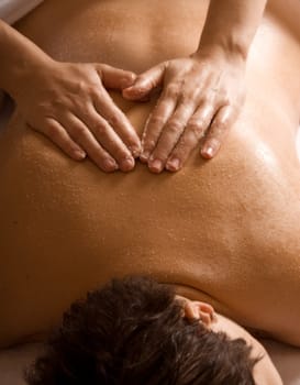 nice woman relaxing with a massage therapy