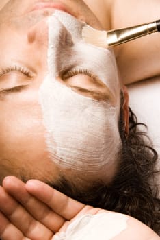 man relaxing with a nice facial lotion