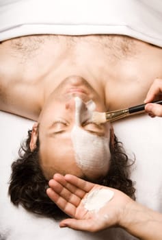 man relaxing with a nice facial lotion
