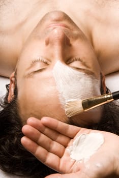 man relaxing with a nice facial lotion