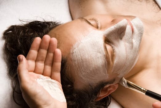 man relaxing with a nice facial lotion