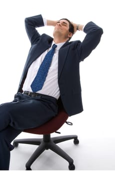 man in a blue suit with eyes close day dreaming