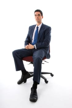 man in blue suit sitting on a chair