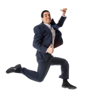 man in blue suit jumping with thumbs up