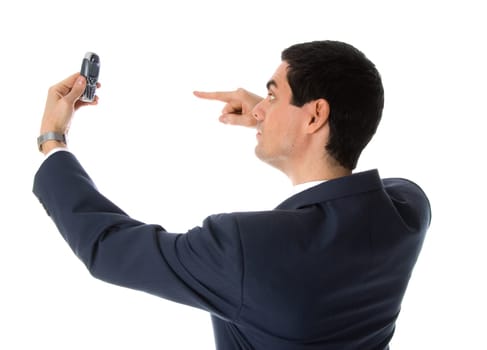 man in blue suit pointing at his cell phone