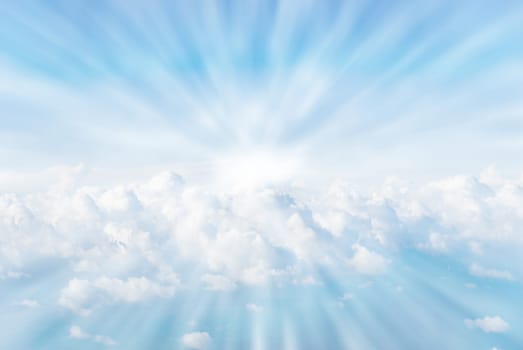 white fluffy coulds from heaven sun rays
