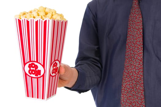 man giving some popcorn at a movie
