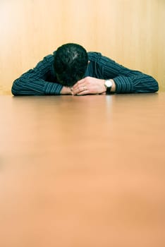 business man sleeping at his desk in the office