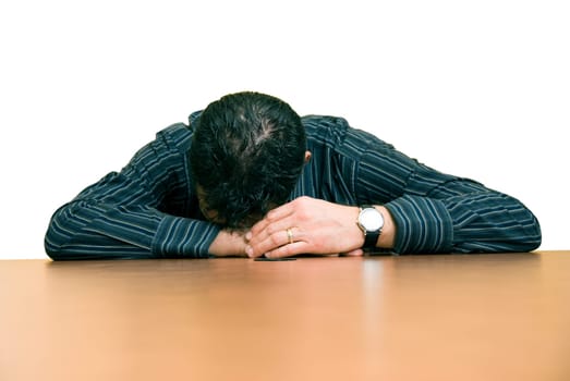business man sleeping at his desk in the office
