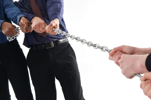 Business team pulling to win on isolated white