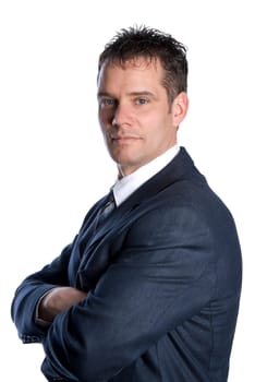 businessman in a blue suit with arms crossed