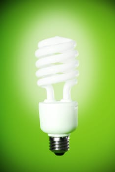 eco light bulb on a green background