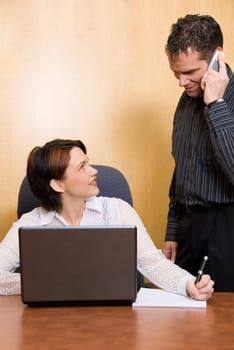 two business colleagues in a boardroom in a meeting