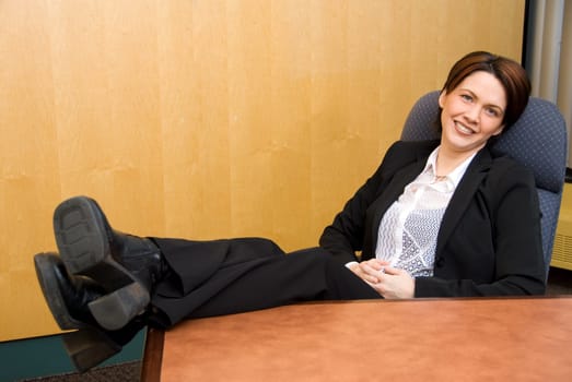 relaxed business woman with her feet up
