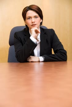 serious business woman in a boardroom table