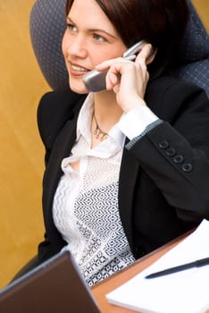 cute business woman on the phone chatting