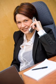 cute business woman on the phone chatting