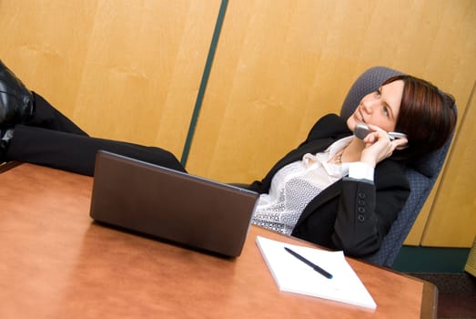 relaxed woman happy on the phone chatting