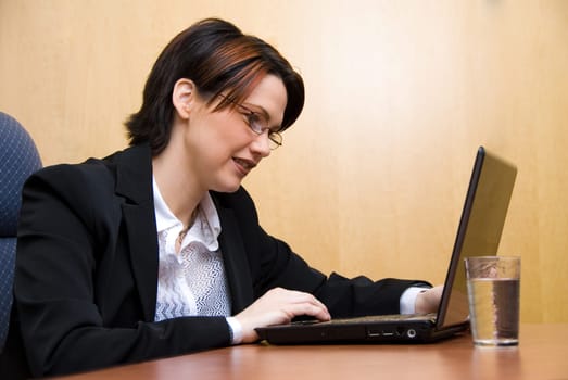 business woman working hard on her laptop