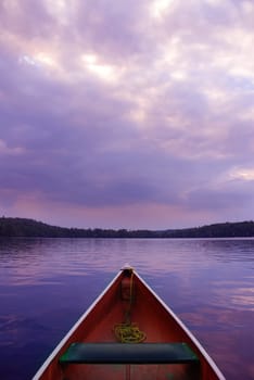 boat at sunset on lake