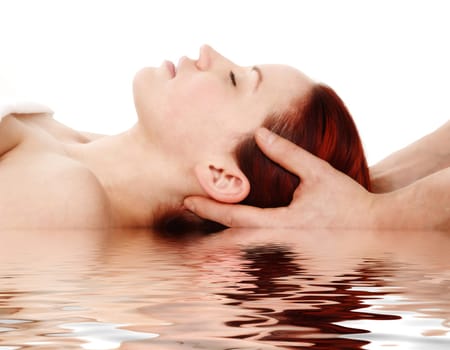 woman getting a head and shoulder massage on white background