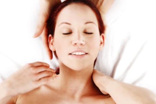 woman getting a neck and shoulder massage