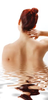woman from the back showing neck pain